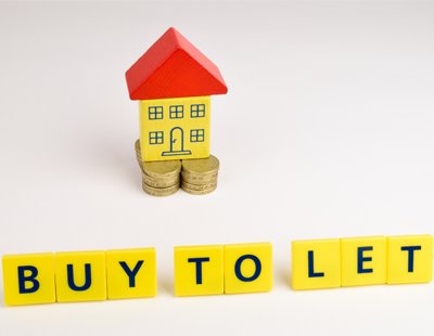 buy to let and house on stacked coins